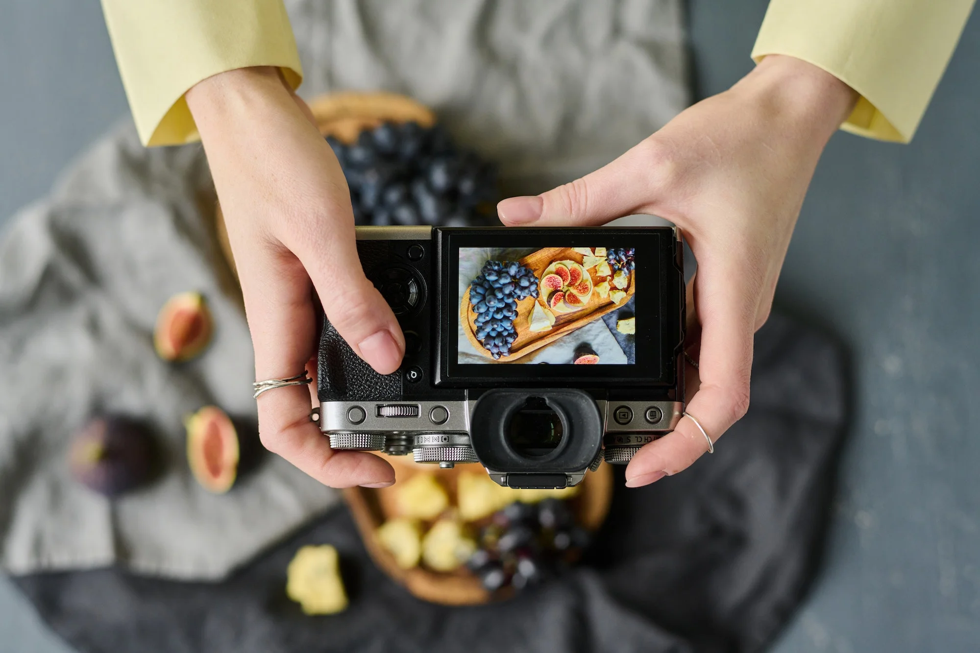 woman-photographing-food-on-the-phone.webp